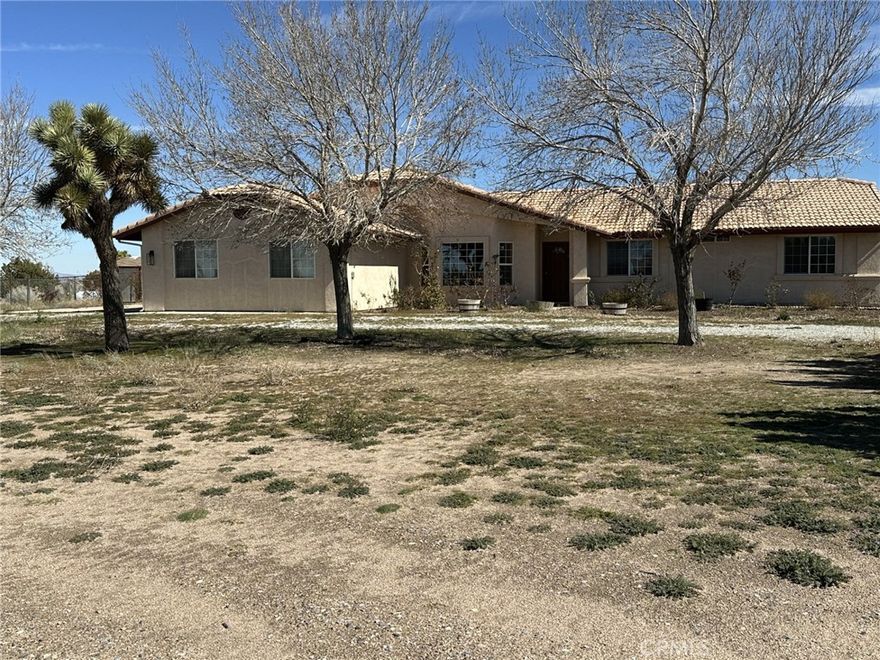 Location! Location! Location! – Spacious Home on 1.5 Acres!



Welcome to wide open spaces just minutes from the I-15 freeway! Located only two city blocks from pavement, this property offers both convenience and country living. Bring your toys, bring your horses, and enjoy all the room you’ve been looking for.



Inside, the great open floor plan features a large family room with a cozy corner fireplace—perfect for gatherings. The kitchen opens to the family room and includes a walk-in pantry for plenty of storage.



This home offers 3 spacious bedrooms, including a main suite with a walk-in closet and a private bath with dual sinks.



Enjoy the outdoors year-round in the enclosed patio filled with natural light, ideal for morning coffee or relaxing evenings.



The property is mostly fenced and includes two additional storage sheds, making it perfect for hobbies, animals, or extra space. All this sits on approximately 1.5 acres in the desirable Great Oak Hills area.