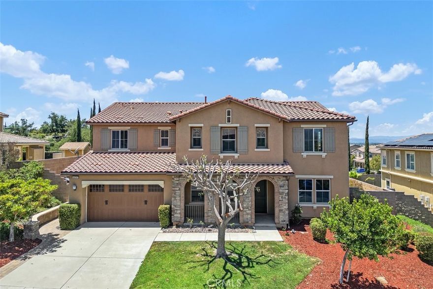 Located in the highly sought-after, resort-style community of Morgan Hill within the coveted Great Oak High School boundary.  This impressive 5-bedrooms and 3.5-bathroom view home features two well-sized primary suites, one downstairs and one upstairs. Stunning "rough scaped" flooring throughout the whole downstairs. Formal dining room connects into a large butler 's pantry. Granite counters are accented with dark, rich cabinetry. Full of storage. Completes with exquisite lamps, trendy crown molding, custom stylish window blinds and atmospheric plantation shutters throughout. Newly painted interior, newly installed patten carpet. Upstairs has a bright loft with beautiful mountain view. All ample bedrooms feature functional ceiling fan/lights. Step outside to a fully landscaped yard . The location near the schools, well-known wine country and all the daily necessities. Short walking distance to community parks, beach volleyball court. Morgan Hill clubhouse amenities offer swimming pool (including lap pool), tennis /pickleball courts, craft room, gym, game room and even more.