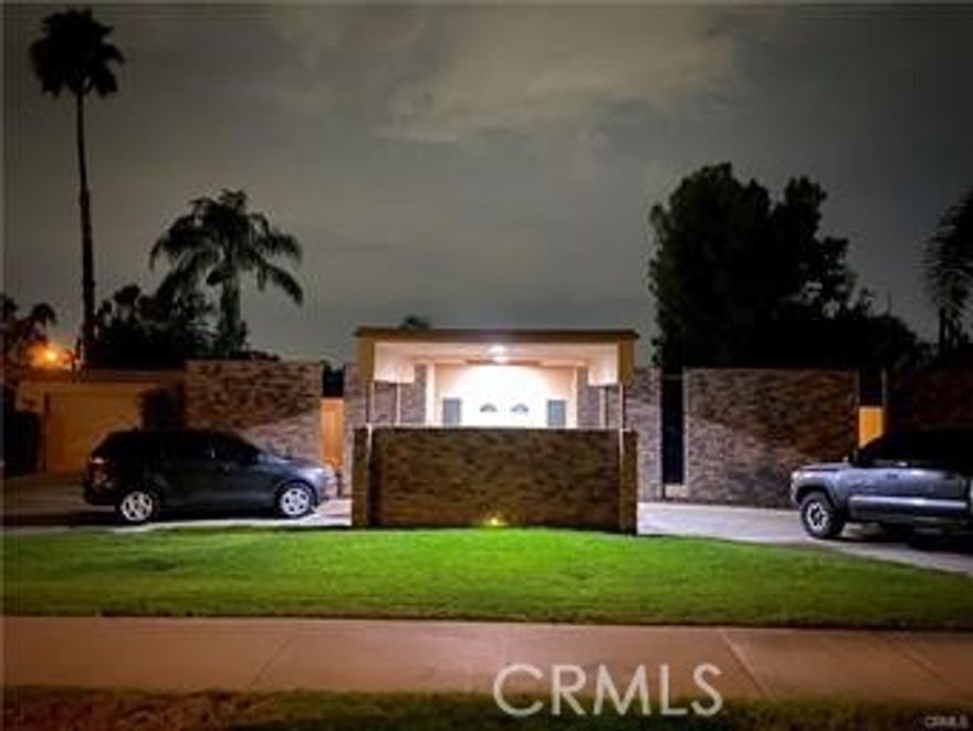 Highly sought after Mid Century Modern home located on a quiet, tree lined street. This corner lot has a grand hotel style circular driveway with porte-cochere drive through entrance. Newly Installed solar panels. New Owner must take over Solar Loan, Property being sold AS IS.