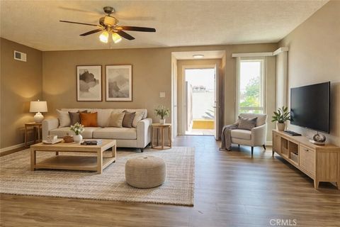 Photo of 15641 TUSTIN VILLAGE Way #A, Tustin, CA 92780 (MLS # NP26081339)