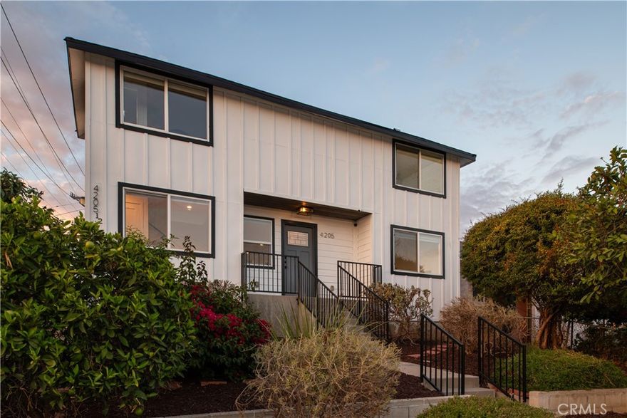 Set on a gently elevated lot in the heart of City Terrace, this beautifully remodeled two-home property pairs design-forward upgrades with warmth, light, and versatility — offering a fresh take on modern Eastside living. Inside the main home, 1,350 square feet unfold with an effortless sense of flow. The open living, dining, and kitchen areas move seamlessly together, framed by natural light that fills the space throughout the day. Every detail, from the new finishes to the cohesive palette, was chosen to create a feeling of calm, balance, and connection. Behind the main home sits a fully permitted ADU completed in 2024 — a modern 810-square-foot residence with its own address, full kitchen, comfortable living area, two bedrooms, and a beautifully finished bath. It’s an inviting space that feels both independent and connected, perfect for extended family, guests, or rental income. Between the two homes is a private outdoor area that feels like an extension of the interiors — open, versatile, and ready for gathering. Whether hosting dinner with friends or enjoying quiet mornings with coffee, the setting brings together ease and privacy. A newly paved alleyway provides parking for up to three cars with smooth, easy access. Located in the vibrant community of City Terrace, you’re minutes from Cal State LA, USC Keck, Downtown LA, South Pasadena, and Hollywood, along with the Eastside’s thriving food and art scene — from local gems along César Chávez to galleries and cafes that define the area’s creative energy. A space that feels both inspiring and grounded — where design, comfort, and flow come together naturally.
