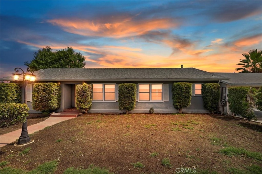 Incredible view .....remodeled, single story home with separate downstairs unit with bedroom, kitchen and separate bathroom. The location is directly across from LLU Hospital and University. This home has beautiful wood floors, stunning remodeled kitchen. This home is a gardeners paradise with an abundance of fruit trees and mature avocado trees. A new irrigation system has been installed. A beautiful deck looks out to the surrounding mountains where you can enjoy beautiful sunsets and entertain. The downstairs unit could be used as a rental with a separate entrance or a mother in laws quarters. New window treatments allow sunlight to fill the home.This home is located on a quiet dead end street with ample parking. Walk in organized closet is in the primary bedroom with adjacent bathroom. There is a two car carport, where the washer and dryer are located is off of the kitchen. The kitchen has lovely granite counter tops and beautiful wood cabinetry with sunny garden window. This home is a well constructed family home perfect for the growing family in a lovely neighborhood.