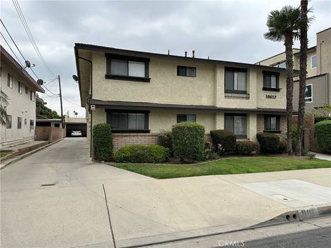 Photo of 10612 Parrot Ave, Downey, CA 90241 (MLS # DW25280830)