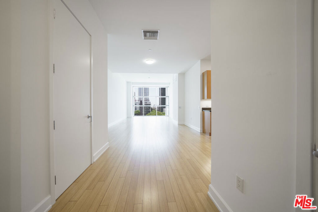 Prestigious 2 bedrooms 2.5 bathroom residence in The Summit high-rise building offers sophisticated and modern living in a centrally located in Wilshire Center. Gleaming hardwood floors, luxurious granite countertop, cheek modern kitchen cabinet with stainless appliances. Very bright unit over 1,700 sq ft of spacious open floor plan with floor to ceiling glass windows all around, breath taking city views, and 12 'high ceilings. 24 hour guard gated, Side by Side parking, and many amenities tenants can enjoy. Absolutely stunning unit! A Must see! See Pvt remarks for showing inst.