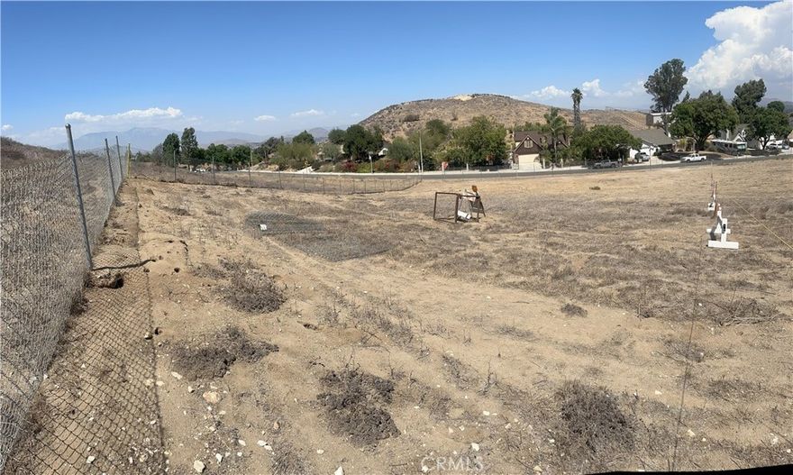 Nearly half an acre (0.45 acres) available in a highly desirable and established Riverside neighborhood. This property offers the perfect chance to design and build your dream home. Enjoy the benefit of a low property tax rate of just 1%—a rare find today. Utilities are conveniently located at the street, making development more straightforward. The location provides easy access to the 91 Freeway and is only about 30 minutes from Orange County. Nearby you’ll find Tyler Galleria, medical centers, great dining options, and both public and private universities.