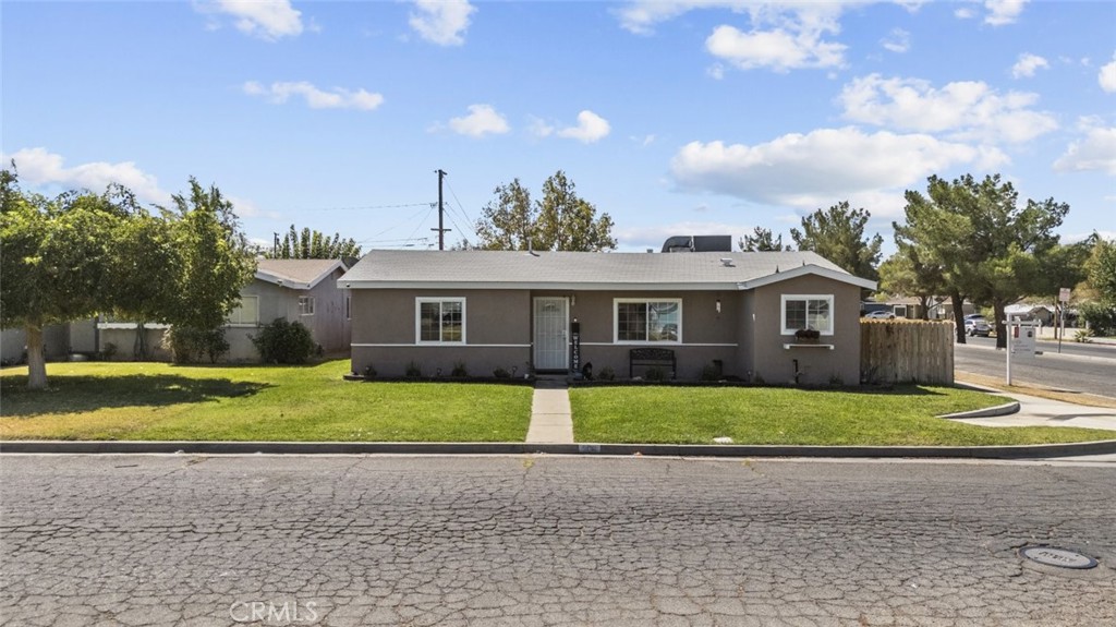 Welcome to 506 E Lingard Street, a well-maintained 4-bedroom, 2-bathroom home offering comfort, functionality, and space to grow. With 1,227 sq ft of living space on a generous 6,768 sq ft lot, this single-story gem is perfect for families, first-time buyers, or anyone seeking a peaceful Lancaster lifestyle.
Once inside enjoy the cool breeze with ceiling fans throughout, recessed lighting, and a thoughtful layout that includes a linen closet for added storage. The kitchen is a standout, featuring granite countertops, a white tile backsplash, stainless steel appliances, and ample cabinet space, perfect for meal prepping and entertaining.
Both bathrooms are finished with tiled showers, providing a clean and functional space. Outside, the detached 2-car garage offers great storage or workshop potential. The lush front yard landscaping adds curb appeal, while the spacious backyard features green grass, a fire pit, and plenty of room for gatherings, play, or relaxing evenings under the stars.