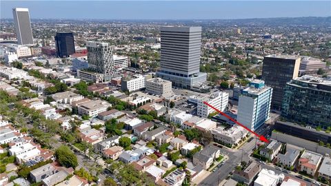 Photo of 657 S La Jolla Ave, Los Angeles, CA 90048 (MLS # SW26027273)