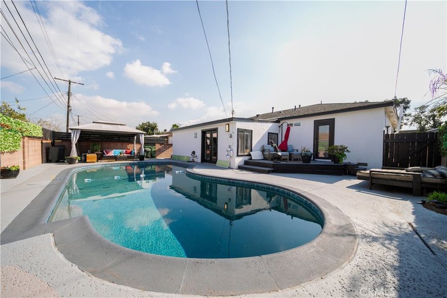 Pool Home in Gardena, CA that is Move-In Ready 3 Bedroom 3 Bath —with attached Studio/Den and 2 bathrooms with unknown permits. Can show the house except the studio as it is occupied until mid February. Refurbished original redwood floors, fresh paint inside and outside. Remodeled open concept kitchen, remodeled pool and bathroom. Will consider selling fully furnished with the right offer. ADU/garage plans available at an additional cost.