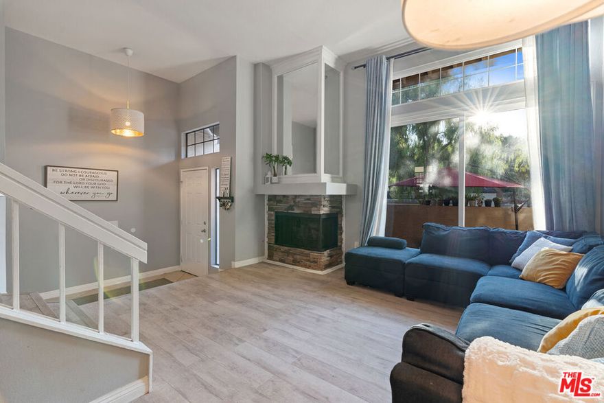 Spacious 2 bedroom, 3 bathroom home offering 1,515 sq. ft. of comfortable living space in the desirable Phillips Ranch Hidden Valley gated community.  Situated in a prime location close to the pool and near the front of the community, the home offers both convenience and easy access.  The updated kitchen showcases granite countertops, stainless steel appliances, white cabinetry, recessed lighting, and a breakfast bar for casual dining, with access to a private outdoor balcony.  The open and bright living room features vaulted ceilings and a cozy fireplace, creating the perfect setting for relaxing evenings, hosting guests, or enjoying a comfortable media space.  Sliding doors lead to a private patio, extending the living area outdoors for barbecues or quiet enjoyment.  A direct-access two-car garage with laundry area provides hassle-free living.  Upstairs, you'll find two spacious primary bedrooms, each with vaulted ceilings, en-suite bathrooms, soaking tubs, and abundant natural light.  Residents of Hidden Valley enjoy resort-style amenities including two pool and spa areas, tree-lined greenbelts, and plenty of space for walking pets.  Conveniently located near shopping, dining, schools, and easy access to the 60 freeway.