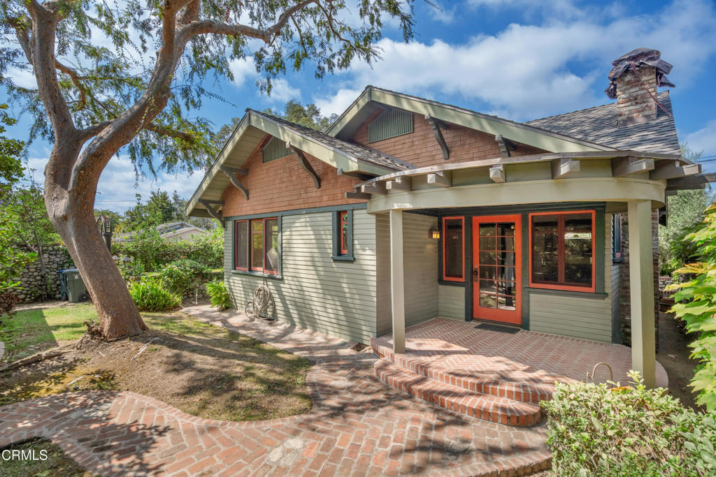 This newly renovated Craftsman cottage in the desirable Madison Heights neighborhood offers 1 bedroom and 1 bathroom with timeless character, modern upgrades and lots of private outdoor space for entertaining or relaxing. The inviting interior features freshly painted walls, new recessed lighting, and beautifully maintained wood floors. Original details--including box-beam ceilings and a classic river-rock fireplace--bring warmth and authenticity to the home. The kitchen is appointed with a new range hood, a new retro-style Galanz refrigerator, and an authentic Heartland gas range/oven. A dedicated laundry area located inside the home includes a new washer and dryer, while the bathroom has been tastefully upgraded with a lighted Kohler medicine cabinet, new toilet, and exhaust fan. Additional improvements include updated plumbing and a reinforced foundation for peace of mind. Parking is privately accessed from Langford Alley, secured by an automatic gate and your own entryway. An additional room in the basement can be used for additional storage. Move-in ready and ideally located, this home perfectly balances Craftsman charm with today's comforts--a true Madison Heights gem.
