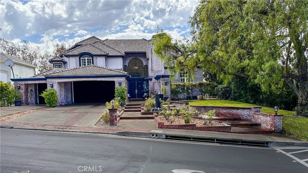 This stunning home comes with a massive credit offered by the seller, use it toward renovations, upgrades, interest rate buy-downs, or any improvement of your choice! Customize this already impressive property to perfectly match your vision. Don’t miss this rare chance to add value and create your dream home with built-in flexibility. Schedule your showing today! ...Experience timeless luxury in this exquisite French Chateau, located in the exclusive gated community of Hunt Club Estates. A grand two-story foyer with soaring ceilings and a sweeping curved staircase sets the stage for refined living.Incredible Opportunity!
Designed with both elegance and function in mind, this home features a spacious formal living and dining room, along with a spectacular custom library ideal as a large office, bonus room, or additional living space. On the main level, a second semi master/bedroom suite with private access offers the perfect setup for a mother-in-law suite or long-term guests.
Upstairs, you'll find three generously sized bedroom suites—two with private balconies—plus two additional bedrooms with oversized closets. There's also a serene massage or gift room, and a versatile space that can serve as a study, additional bedroom, or personal retreat.
The entertainer’s kitchen is fully equipped with a six-burner stove, stainless steel appliances, warming drawers, a large granite island, and a walk-in pantry. A bright and spacious breakfast area complements both formal and informal dining rooms.
This home boasts an open, step-free layout, three beautiful fireplaces, and multiple brick patios that extend the living space outdoors. The large laundry room features a sink, leathered granite countertops, and a direct laundry chute.
Dramatic ceilings in the entry, formal living room, and master suite complete the picture, offering gorgeous views and a feeling of grandeur throughout.
