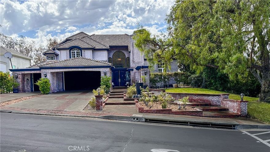 This stunning home comes with a massive credit offered by the seller, use it toward renovations, upgrades, interest rate buy-downs, or any improvement of your choice! Customize this already impressive property to perfectly match your vision. Don’t miss this rare chance to add value and create your dream home with built-in flexibility. Schedule your showing today! ...Experience timeless luxury in this exquisite French Chateau, located in the exclusive gated community of Hunt Club Estates. A grand two-story foyer with soaring ceilings and a sweeping curved staircase sets the stage for refined living.Incredible Opportunity! 



Designed with both elegance and function in mind, this home features a spacious formal living and dining room, along with a spectacular custom library ideal as a large office, bonus room, or additional living space. On the main level, a second semi master/bedroom suite with private access offers the perfect setup for a mother-in-law suite or long-term guests.

Upstairs, you'll find three generously sized bedroom suites—two with private balconies—plus two additional bedrooms with oversized closets. There's also a serene massage or gift room, and a versatile space that can serve as a study, additional bedroom, or personal retreat.

The entertainer’s kitchen is fully equipped with a six-burner stove, stainless steel appliances, warming drawers, a large granite island, and a walk-in pantry. A bright and spacious breakfast area complements both formal and informal dining rooms.

This home boasts an open, step-free layout, three beautiful fireplaces, and multiple brick patios that extend the living space outdoors. The large laundry room features a sink, leathered granite countertops, and a direct laundry chute.

Dramatic ceilings in the entry, formal living room, and master suite complete the picture, offering gorgeous views and a feeling of grandeur throughout.