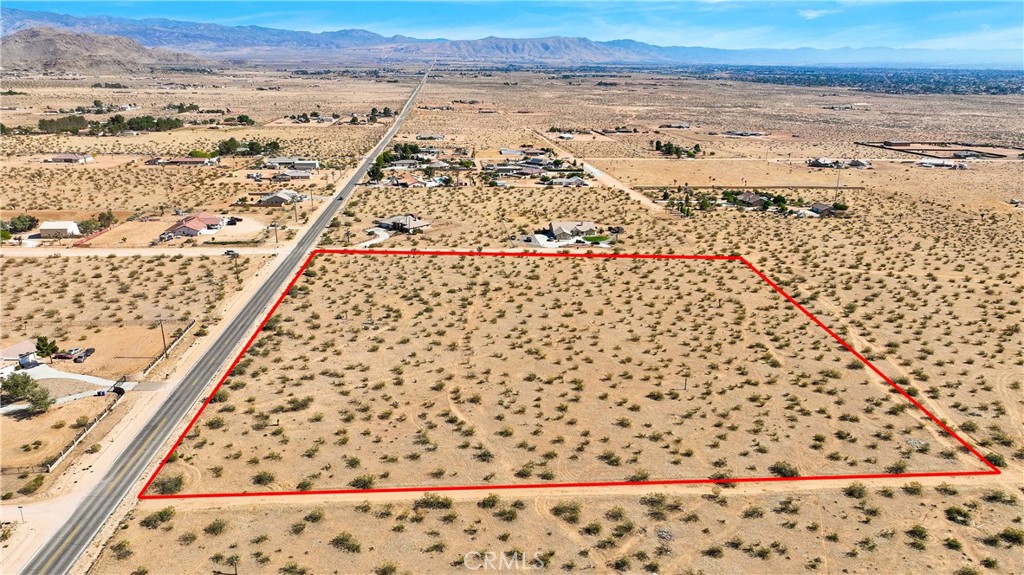 LOOKING FOR A PLACE TO BUILD YOUR DREAM HOME. LOOK NO FURTHER! ZONED (R-E) Estate Residential (1 du/1 to 2.5 gross acres). Rural living at it's best but close enough to all the amenities such as restaurants, schools, parks and shopping. Paved road. Sewer at the street. Over 8.5 flat acre lot. Newer homes close by. Amazing mountain and desert views. Utilities close by. Check with The Town Of Apple Valley for requirements to subdivide. Buyer to verify all information and utilities and do their due diligence.
