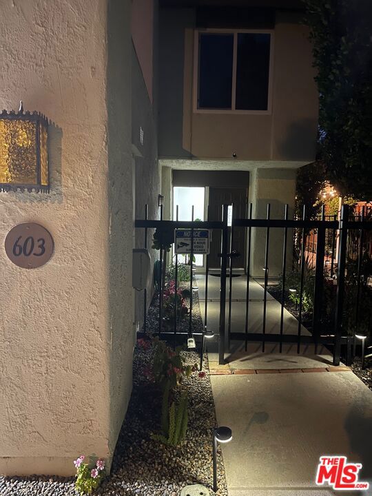 Racquet Club Villas welcomes you to this move-in turnkey end unit townhome. Complex consists of 264 units and there are only four homes with a POOL, this is one of them. This is not a community/association pool, this is your own private pool in your back yard. Beautifully updated 3 bedroom + loft w/FP and 2 1/2 baths. Updated bathrooms with Quartz countertops, hardware, faucets and toilets throughout. Huge living room w/FP and what a view into your private back yard with your own private pool. Kitchen has been recently remodeled and has all new Stainless Steel appliances. The new kitchen counter is a Concretta sealed plaster. Windows/doors have been sealed with LLumar Safety Coating w/tint. Garage went thru a major redo and just installed an Epoxy flooring. Pool went thru a major remodel and just had new wiring with a Jandy Aqua link PDA P4 Automation System w/Electrical repair. All now on a remote control. New Washer/Dryer just delivered. Truly a home in move-in condition. Don't miss this once in a Century purchase.