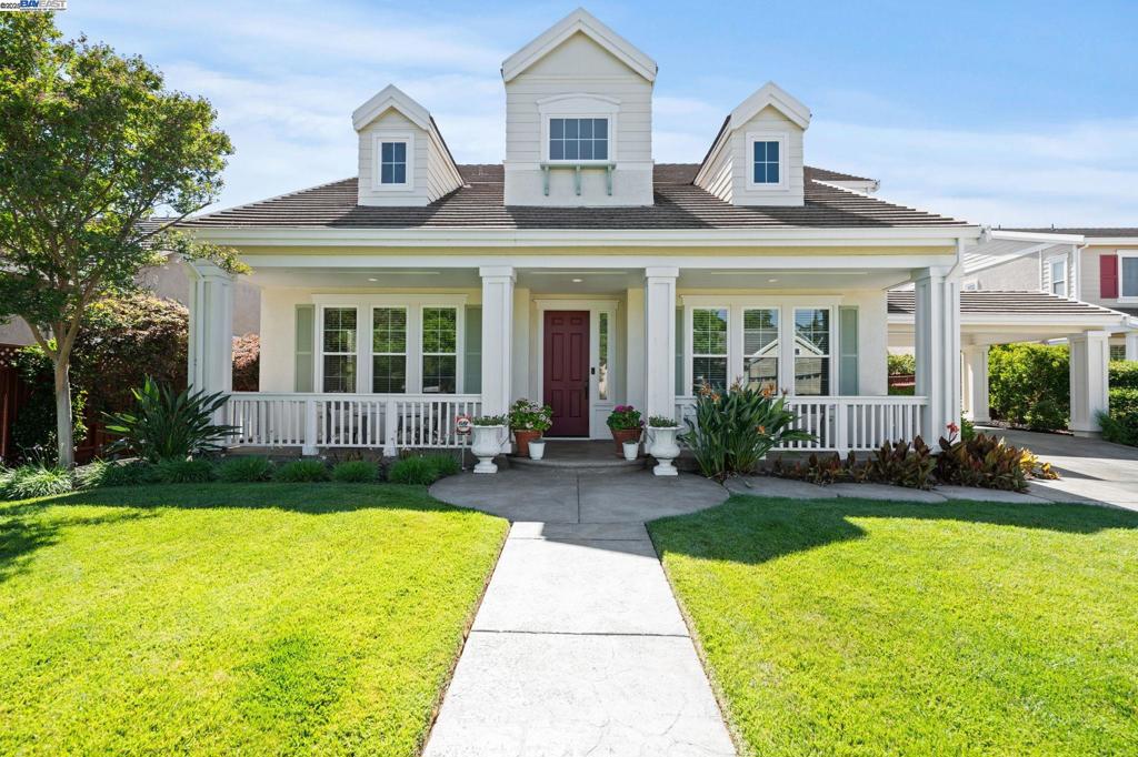 Nestled at the end of a quiet cul-de-sac in Kristopher Ranch, this meticulously maintained 5-bedroom, 3-bath home offers timeless elegance and exceptional comfort. Flooded with natural light, the gourmet kitchen features granite countertops, stainless steel double ovens, gas range, island, breakfast nook, and a butler’s pantry perfect for everyday living and entertaining. The main level includes a guest bedroom and full bath, while upstairs, the spacious primary suite boasts hill views, a spa-like bath with oversized shower, Jacuzzi tub, and granite vanities. Custom details throughout include a marble-faced fireplace, elegant window treatments, wine pantry under the stairs, and generous storage. The backyard is built for entertaining, with stamped-concrete patio, gas BBQ hookup, rose and citrus gardens, and a private swim-spa. Additional highlights include a four-car garage with workshop space and mini split system, long driveway, zoned HVAC, dual-pane windows, alarm system, and low-maintenance landscaping. Located near top-rated schools, downtown Livermore, wineries, and commute routes this home truly embodies South Livermore living.