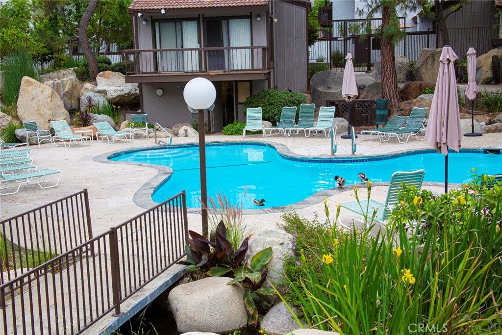 Photo of 6275 Canoga Avenue #73, Woodland Hills, CA 91367 (MLS # SR26069870)