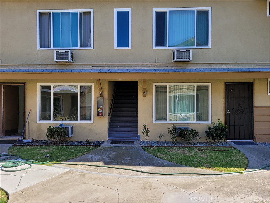 Charming 2 bedrooms, 1.5 bath, 2 car garage space, Newer Kitchen cabinets with countertops, Recessed lighting in the living room, Double pane windows, Newer vanities, Laminated wood flooring, Wall unit A/C and heating, Downstairs unit, Patio in the back yard, Move in condition.