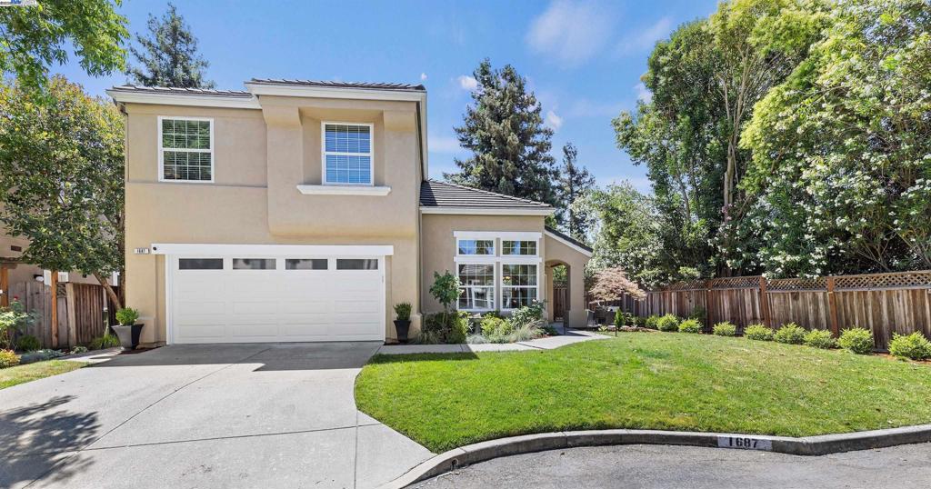 Welcome to 1687 Silverwood Court, a beautifully updated home in one of Danville’s desirable and private neighborhoods. Tucked away on a quiet cul-de-sac yet just minutes from downtown, this home offers the perfect blend of peaceful living and everyday convenience. Recent updates include brand-new luxury vinyl plank flooring throughout the main level and a remodeled kitchen featuring stainless-steel appliances, modern cabinetry, and stone countertops. The inviting floorplan boasts vaulted ceilings, large windows, and an abundance of natural light. The spacious living and dining areas flow seamlessly for entertaining, while the cozy family room opens to the backyard for indoor-outdoor living. Upstairs, you’ll find generously sized bedrooms, including a serene primary suite. Enjoy access to the community pool and beautifully maintained common areas. This home combines comfort, style, and an unbeatable location in the heart of Danville!