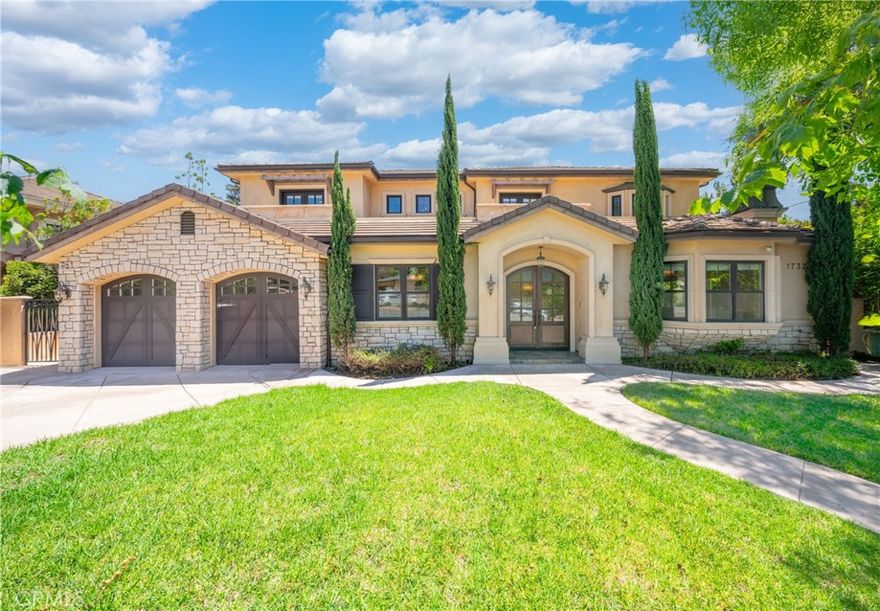 Nestled in the prestigious Highland Oaks neighborhood, this exceptional residence offers an elegant blend of timeless design, luxurious finishes, and an unbeatable location near award-winning Arcadia schools. Situated on an expansive 10,358 sq ft lot with captivating mountain views, the home showcases exquisite craftsmanship and thoughtful attention to detail throughout.



A grand double-door entry welcomes you into soaring two-story ceilings and gleaming marble floors, setting the tone for the refined living spaces beyond. The flowing floor plan spans 4,437 sq ft and includes a gracious formal living room with fireplace, a stately library/office, a formal dining room ideal for entertaining, and a spacious family room overlooking the serene backyard.



The gourmet kitchen is a chef’s dream, complete with top-tier appliances, custom cabinetry, granite countertops, and a separate wok kitchen. Travertine and wood flooring add warmth and sophistication throughout the home.



Four generously sized en suite bedrooms provide comfort and privacy, each designed with abundant natural light and refined finishes. Additional features include a digital intercom system and custom built-ins.



The outdoor area is equally impressive, offering a concrete patio perfect for al fresco dining and gatherings. This remarkable property is a rare opportunity to own a beautifully maintained home in one of Arcadia’s most sought-after communities.
