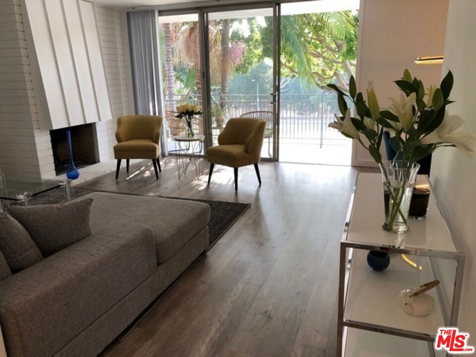Mid-Century Modern in heart of Beverly Hills. Beautiful large luxury apartment. Walk to restaurants, shops and Rodeo Dr. Den with doors can be used as third bedroom, office,formal dining, media room. Large balcony, lots of closets. Bright and open flow. No shared walls, very private.