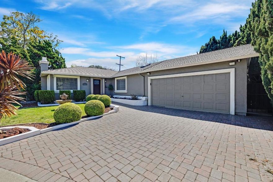 This home is a perfect 10! Offering single-story living, a large lot, and generous square footage, its located in a peaceful cul-de-sac and truly has it all. Situated on a rare 8,016 sq ft lot, this beautifully updated home features 4 bedrooms, 2 bathrooms, and 1,911 sq ft of living space. Recently remodeled with modern bathrooms, new flooring, and fresh paint throughout, this home is move-in ready. The living room boasts a cozy fireplace, while the spacious family room includes a built-in bar ideal for entertaining. The large private backyard features a built-in BBQ, making it perfect for relaxing or hosting gatherings. The functional layout provides ample storage and closet space for added convenience. Conveniently located next to a park and just minutes away from both Apple campuses, LinkedIn, Caltrain, and downtown Sunnyvale. Enjoy easy access to excellent dining options, AMC theaters, Whole Foods, and more. This home is the ultimate blend of comfort, style, and location!