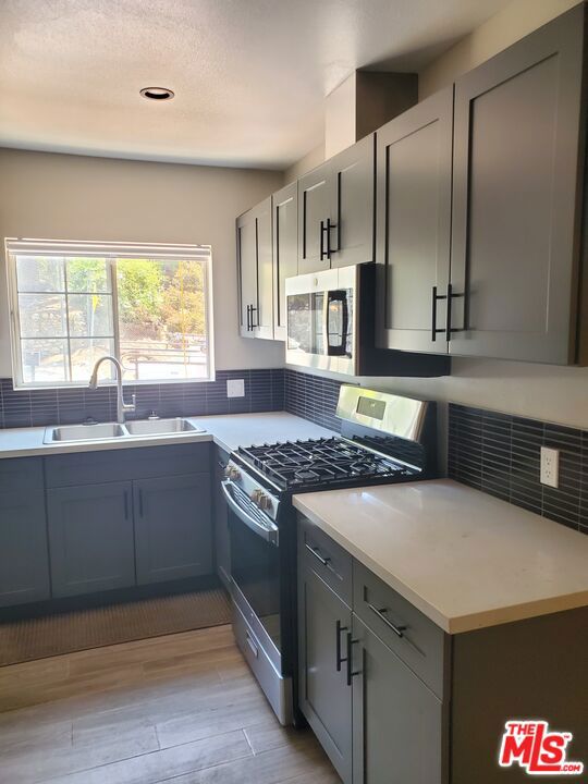 Welcome to this TOTALLY REMODELED Duplex unit in desirable Highland Park! It has all the comforts of home, new stainless steel refrigerator, range/stove, cabinets, in-unit stackable washer and dryer, wall-to-wall closet space, and bathroom updated. The rear yard will have an outdoor space to enjoy, relax or entertain. Property sits in a cul-de-sac on a corner with street parking. Located minutes away from parks, bike paths, freeways, restaurants, City of Pasadena, Rose Bowl, Downtown LA and more. Highland Park and South Pasadena Metro Stations are a 5 minute drive away. Available, now, to show with an appointment!