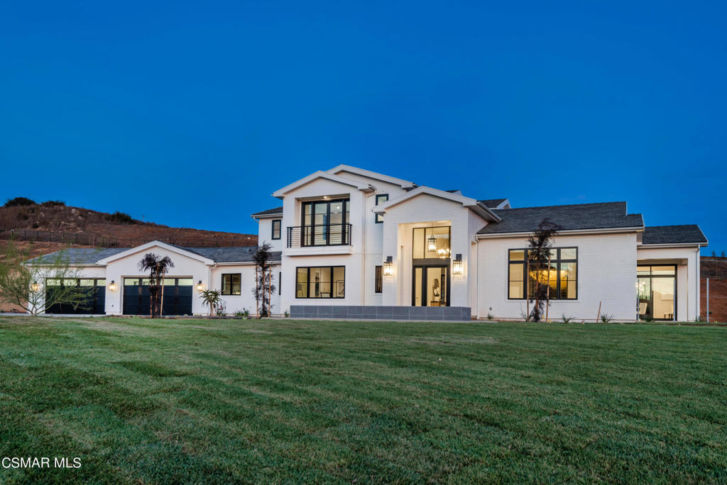 Brand new luxury estate in the exclusive all new gated community, The Estates at North Ranch! This American Transitional custom home sits on an all usable, nearly 1.5 acre lot with stunning views, and a brand new pool and spa with BBQ center! Sensational finishes throughout the over 6600 square foot open concept floor plan. Features include multiple sets of Fleetwood sliding pocket doors, two story grand living room with floor to ceiling fireplace, soaring custom ceilings, a dream double island kitchen that opens seamlessly to the family room, with double sided fireplace leading to a game room with wet bar. The downstairs primary suite provides a sitting area with fireplace, dual closets and a beautiful primary bath. There are 2 additional bedroom suites down, plus 2 more bedroom suites upstairs. The formal dining room is enhanced by a temperature controlled wine cellar. The grounds are second to none with three separate yards big enough to build almost every amenity imaginable! The Estates At North Ranch is Ventura County's new luxury development , fully gated consisting of only 15 epic custom luxury estates in prime upper North Ranch!