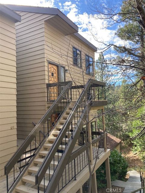 Photo of 27657 Peninsula Dr, Lake Arrowhead, CA 92352 (MLS # IG26087488)