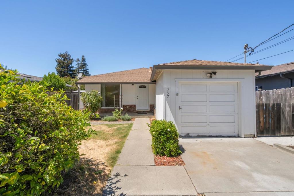 An exceptional opportunity for a large lot in a sought after Redwood City Location. Situated just moments from Marsh Manor Shopping Center where you'll be getting coffee, groceries, dining, and so much more. Plus, near to exciting Downtown Redwood City and major commuting corridors making this just minutes from Silicon Valley's tech, science, and education giants. This charming one-level home has an attached one-car garage. Enter via the front porch to sun-filled spaces, hardwood floors and a flexible floorplan. The kitchen has a gas range, convenient garage access, and an eat-in area. The expanded floorplan provides for a large bonus room which could be used as office, flex space or more. An expansive primary suite with exterior access, ensuite bath, and great closet space has the potential to double as a possible "in-law" space. There is a second bedroom, and a full hall bath. Outside, tons of yard space on three sides, a detached shed for ample storage, fruit trees, all in a private setting. With endless possibilities inside and out, what can you dream up for this one-of-a-kind property?