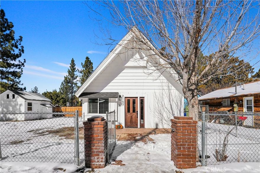 LOCATION! LOCATION! LOCATION! Welcome to 2107 4th Ln. Located in the heart of Big Bear! This beautiful 2 bedroom 1 bathroom home sits on a great size double lot. The interior of the home contains beautiful vinyl flooring throughout, a wood burning fireplace in the living room, and quartz countertops in the kitchen. The amazing size master bedroom is located upstairs. The room contains a bed with a brand new mattress. Main Bathroom is located downstairs and contains a walk-in shower and sink quartz countertop. There is also one more bedroom downstairs that is a great size. Room also contains room decor. The backyard is perfect for entertaining during all seasons of the year, also contains a huge storage unit. Home is close to Bear Mountain and The Village!! THIS HOME WILL NOT LAST!!