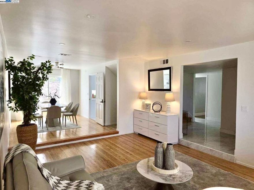 Restored back to the original open floor plan.  Nestled in one of Westborough’s most coveted communities, this newly remodeled residence perfectly blends modern elegance with everyday comfort—offering breathtaking views from nearly every room.  Step inside to a light-filled, contemporary interior adorned with white Modern-style cabinetry, recessed LED lighting, and high-end finishes throughout. The chef-inspired kitchen features floor-to-ceiling soft-close cabinets with pull-out shelves, a sleek modern range hood, and a premium faucet with an integrated hot and cold water dispenser.  Retreat to oversized bedrooms with sweeping vistas, including a lavish primary suite with a designer en-suite bath—complete with a built-in electric bidet for the ultimate touch of luxury.  Thoughtful upgrades include:  Dual-pane windows and sliding doors  New Nest thermostats for climate control  Smart entry lock and Nest doorbell  Finished garage with EV charger  Newly landscaped backyard—ideal for relaxing or entertaining  Move-in ready and meticulously upgraded, this home is the perfect blend of style, function, and location. Opportunities like this are rare—schedule your private tour today and make Westborough luxury your own.
