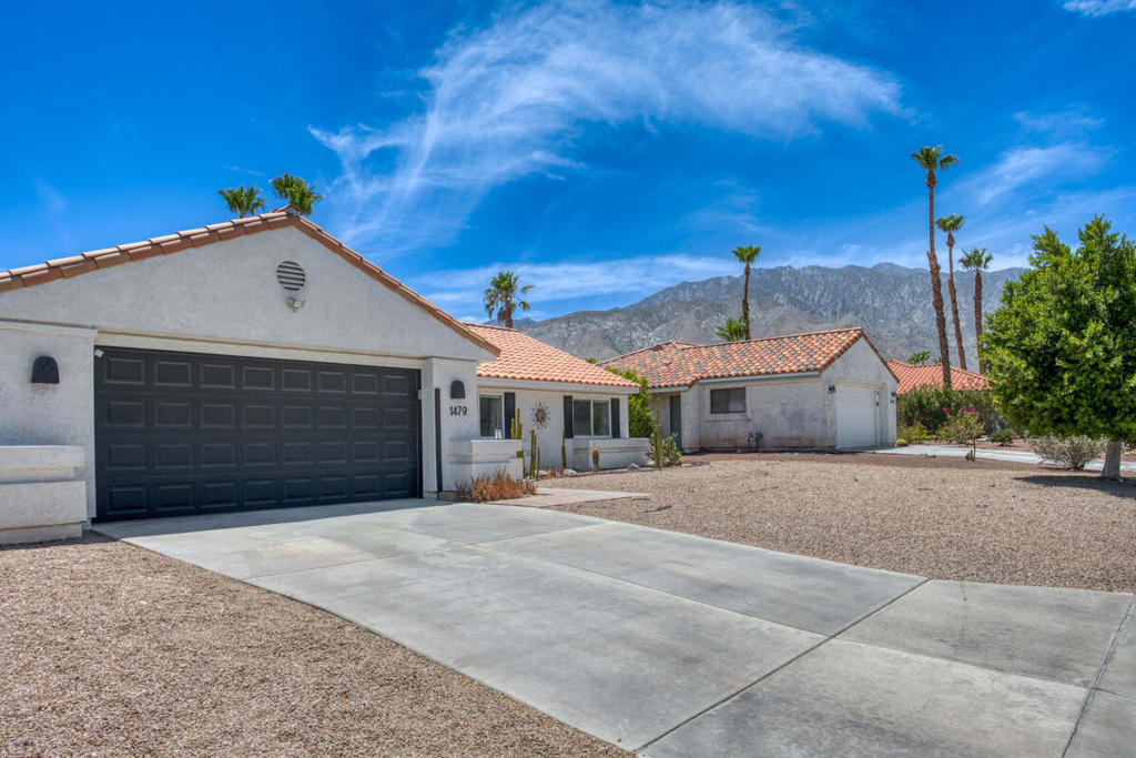 Turn-Key 3 Bed, 2 Bath Vacation Home with Private Pool & Stunning Mountain Views - No HOA! Welcome to your perfect desert escape! This beautifully updated 3-bedroom, 2-bathroom home is fully turn-key and ideal as a vacation rental or personal retreat. Located in a sought-after Palm Springs neighborhood with no HOA, this property features a private in-ground pool and spa, owned solar panels, and gorgeous mountain views. Step inside to an open, spacious layout with vaulted ceilings, stylish light fixtures, and abundant natural light. Expansive sliding glass doors in both the living and dining areas bring the outdoors in, framing picturesque views of the pool and mountains. The bright kitchen offers white cabinetry, ample storage, white appliances, and a breakfast bar--perfect for casual dining or entertaining. The primary suite is a true retreat with direct access to the backyard, a spa-like ensuite featuring a soaking tub, separate walk-in shower, dual sink vanity, and its own private slider to the pool area--ideal for entertaining or relaxing after a swim. Two additional bedrooms share an updated hall bathroom with dual sinks and a tub/shower combo. Enjoy your very own resort-style backyard complete with a sparkling pool and spa, extended patio, and ample deck space for sunbathing or lounging. Additional features include: Whole-house water softening system, Dedicated laundry room, Attached 2-car garage. Also available for rent at $3,850/month, this home is conveniently located near shopping, dining, and all the best that Palm Springs has to offer. Don't miss this rare opportunity to own or rent a fully equipped vacation home in the heart of the desert!