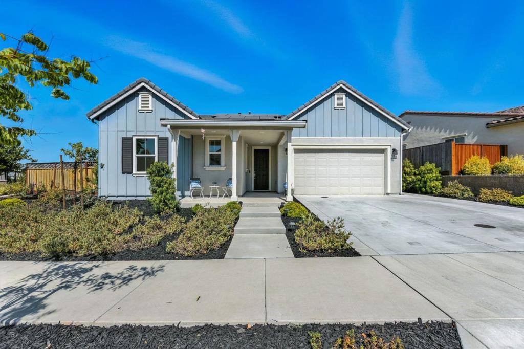 Discover this beautifully upgraded 3-bedroom 2-bathroom single-story home in the sought-after Asher neighborhood of Glen Loma Ranch. Built in 2021, this residence sits on a large corner lot and features a spacious open floor plan with 9-ft ceilings, a modern kitchen with quartz countertops and soft-close cabinetry, an epoxy-coated two-car garage, a designated laundry room, and large walk-in closets. Enjoy a low-maintenance backyard perfect for relaxing or entertaining. Nestled in the scenic foothills of Gilroy, Glen Loma Ranch offers over 150 acres of preserved open space with woodlands, natural canyons, streams, and wildlife corridors. Residents enjoy pedestrian and bicycle-friendly trails, community parks, and gathering spaces. Conveniently located near local schools, award-winning wineries, golf courses, Gilroy Premium Outlets, and Gilroy Gardens with easy access to nearby amenities.