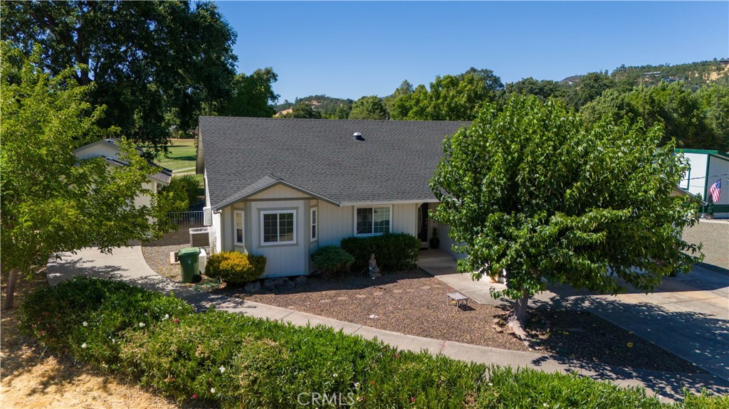 Welcome to this single-level charmer, featuring 3 bedrooms and 2 baths, nestled on a quarter-acre at the end of a quiet cul-de-sac in the gated community of Hidden Valley Lake. Spanning 1,636 sq ft, this meticulous home boasts a desirable floor plan with high ceilings, large rooms with ceiling fans, and abundant natural light. The kitchen is a chef's delight, featuring granite countertops, generous wood cabinetry, and both pendant and recessed lighting. A convenient double-door pantry is found in the hall. Additional features include a new 30-year roof, a Generac whole-house generator, a Rayne Water System, 5 solar tubes for natural light, a tankless water heater, decorator fixtures and indoor laundry. Outside, enjoy a fully fenced backyard with mature landscaping, a custom garden shed, peaceful paths, and a pergola overlooking the golf course. The property also includes a 23 x 14 ft garage with 14 ft high ceilings, in addition to a 2-car attached garage. This vibrant community offers residents access to a 102-acre lake with two beaches, BBQ areas, picnic spots, kayaking, and lakeside relaxation. Amenities include modern banquet facilities, a restaurant, a Pro Shop, tennis courts, fishing docks, a Dog Beach, and an equestrian center. The 18-hole golf course with its own restaurant and fountains, and Creekside Campground with RV hookups, a basketball court, and a baseball diamond, cater to outdoor enthusiasts. Conveniently located two hours north of San Francisco, an hour north of Santa Rosa, and 30 minutes north of Calistoga, this Northern California gem offers an unparalleled lifestyle amidst breathtaking scenery. Don't miss your chance to experience Northern California living – schedule a showing today!