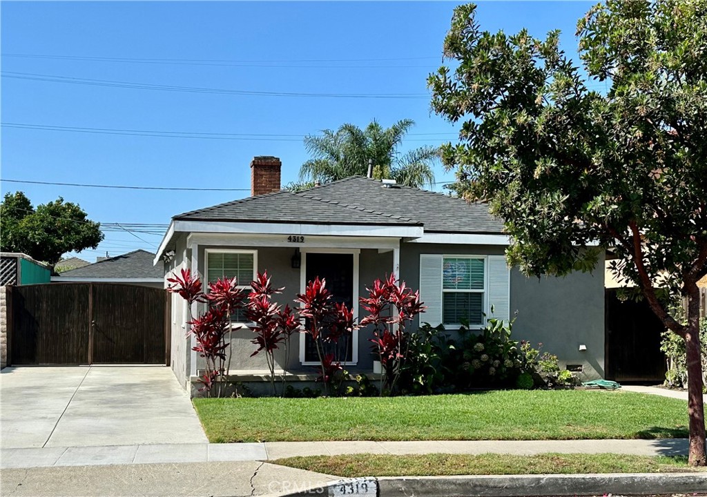 Welcome to this stunning 3-bedroom, 2-bathroom home ideally located in the heart of Culver City, just a short walk to the highly coveted Culver City Schools. Blending timeless charm with modern upgrades, this impeccably maintained residence offers a warm and inviting atmosphere with thoughtful touches throughout.
Step inside to a cozy and functional floor plan featuring gleaming hardwood floors and a classic wood-burning fireplace, perfect for relaxing evenings at home. The recently remodeled kitchen is a dream for any home chef, showcasing rich wood cabinetry, expansive countertops, stainless steel appliances, and an oversized refrigerator for all your culinary needs.
The spacious primary suite offers a peaceful retreat with a large walk-in closet and a stunningly renovated en-suite bathroom. Two additional bedrooms share a beautifully updated full bathroom, offering comfort and style for family or guests.
Enjoy California living at its finest in the lush, private backyard oasis, complete with a custom-built wooden awning ideal for entertaining, al fresco dining, or simply unwinding. Additional features include a detached two-car garage, gated carport which includes 30 amp connection for EV/RV vehicles, newer tankless water heater, and central air conditioning and heating for year-round comfort.
With desirable R4 zoning offering future development potential, access to award-winning Culver City schools and services, and a central location near vibrant Downtown Culver City, Playa Vista, and Marina del Rey, this home is a rare gem you won’t want to miss.