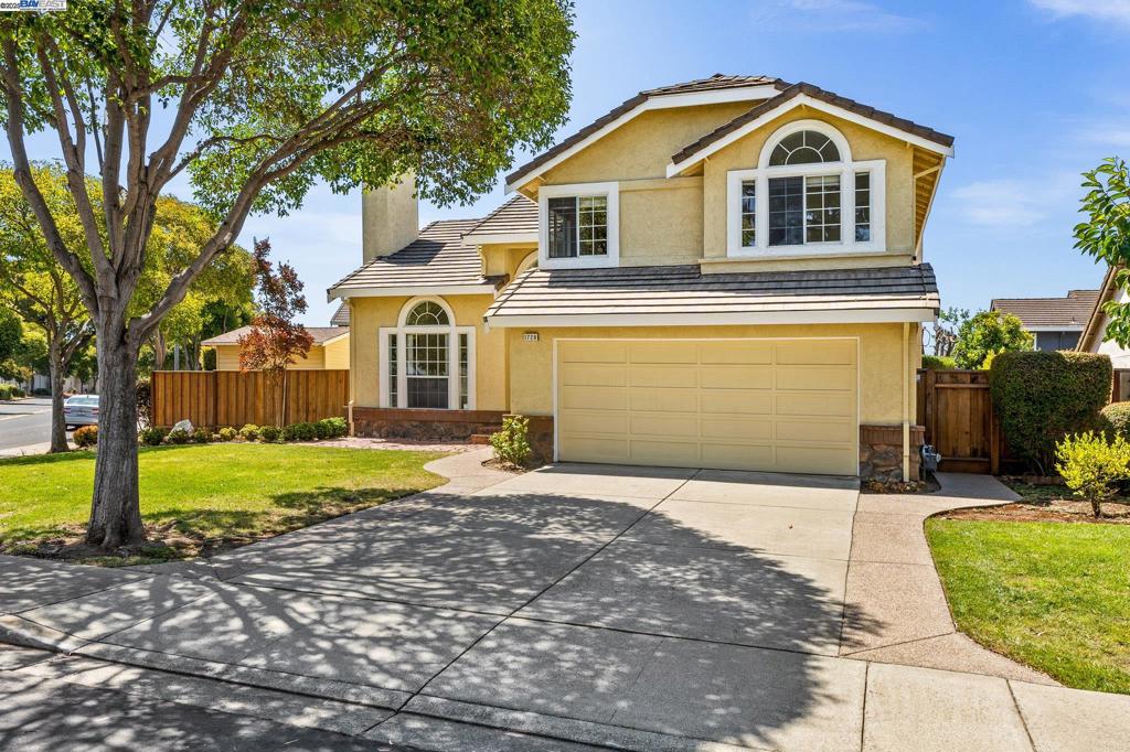 Welcome to this beautifully updated 4-bedroom, 3-bathroom single-family home in the desirable Ashton Place neighborhood of Union City. Situated on an oversized corner lot with potential RV parking, this spacious home features a bright and open floor plan with soaring ceilings and abundant natural light throughout. The main level includes a bedroom and full bathroom, ideal for guests or multi-generational living. Enjoy a formal living room with a cozy fireplace, a sunken dining area, and a charming kitchen with a breakfast nook overlooking the private backyard. The oversized family room offers a second fireplace, perfect for relaxing or entertaining. Upstairs, the primary suite boasts a double-sink vanity and ample closet space, complemented by two additional generously sized bedrooms. The home also features fresh interior and exterior paint, making it completely move-in ready. Outside, enjoy indoor-outdoor living with a large front yard, covered patio, powered shed, and a private backyard lined with mature trees—providing beauty, shade, and privacy. Conveniently located near top-rated schools, parks, shopping, and major commuter routes. Don’t miss this exceptional opportunity!