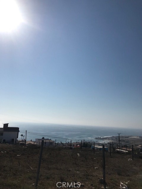 VIEW VIEW VIEW GREAT OPPORTUNITY TO OWN LAND WITH OCEAN VIEW, IN COLONIA (TERRAZAS DEL PACIFICO) IN PLAYAS DE ROSARITO BAJA CALIFORNIA. YOU CAN BUILD YOUR DREAM HOME, THE LOT IS 1,500 SQ/METERS OR 16,145.866 SQ/FT. THE COLONIA HAS ELECTRICITY AND WATER IS IN THE PROCESS OF BEING CONNECTED. THE LOT EXTENDS FROM STREET TO STREET ENTER THROUGH ONE SIDE EXIT THE OTHER. MUST VISIT LOCATION TO APPRECIATE ITS FULL POTENTIAL