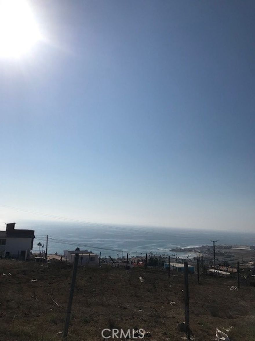 VIEW VIEW VIEW GREAT OPPORTUNITY TO OWN LAND WITH OCEAN VIEW, IN COLONIA (TERRAZAS DEL PACIFICO) IN PLAYAS DE ROSARITO BAJA CALIFORNIA.  YOU CAN BUILD YOUR DREAM HOME, THE LOT IS 1,500 SQ/METERS OR 16,145.866 SQ/FT.  THE COLONIA HAS ELECTRICITY AND WATER IS IN THE PROCESS OF BEING CONNECTED.  THE LOT EXTENDS FROM STREET TO STREET ENTER THROUGH ONE SIDE EXIT THE OTHER.  MUST VISIT LOCATION TO APPRECIATE ITS FULL POTENTIAL