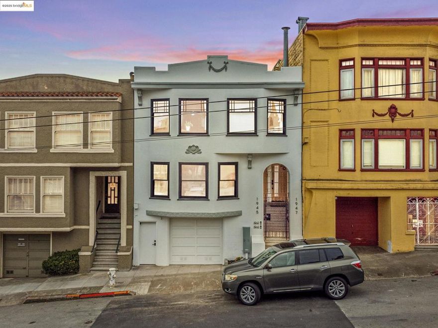 At 1945–1947 Fulton Street, opportunity meets elegance; a rare union of home and haven where one may live and thrive. Nestled beside the University of San Francisco and a short stroll from Golden Gate Park and Haight-Ashbury’s cafés restaurants and shops, these classic San Francisco homes invite both serenity and possibility. #1945 Fulton St is a modern classic reimagined from foundation to rooftop: this 5 bed, 3 bath residence glows with energy and artistry. A 200 A panel with Level 2 EV charger, new plumbing, insulation, heat pump, and tankless water heater support new windows framing the skyline’s mix of modern towers and historic spires. The chef’s kitchen, crowned with Thermador appliances, double ovens, and a professional cooktop, welcomes both cook and dreamer. Upstairs (3 beds, 2 baths) offer tranquil views; below, a 2-bed suite flows to a sunlit garden where a mature lemon tree perfumes the air. Each level enjoys laundry and privacy;  ideal for extended family or income. #1947 Fulton St echoes its sister’s promise: a 2-bed + den/office, 1-bath flat with 200-A service, radiant heating, and new windows; a canvas awaiting creative vision and inspired life.