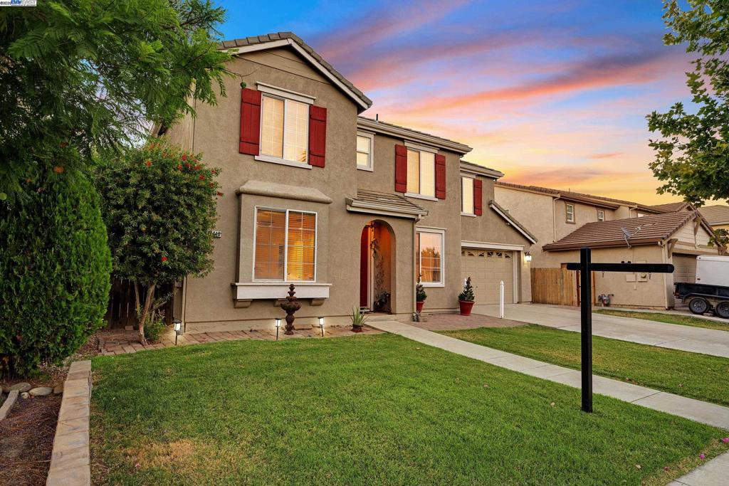 Luxury and warmth flow through this beautifully updated 5-bedroom, 3.5-bath home in Patterson, offering over 3,000 sq ft of living space designed for both style and function. The open-concept layout is anchored by a stunning kitchen with black galaxy granite countertops, stainless steel appliances, an elegant backsplash, and a generous island, all seamlessly connected to the spacious living, dining, and family rooms bathed in natural light. Every detail has been thoughtfully upgraded—renovated bathrooms feature modern finishes, while high-quality flooring, bright interiors, and abundant storage create a refined yet practical environment. Energy-efficient solar panels add value and help reduce costs. Upstairs, a luxurious primary suite with a spa-inspired bath provides a private retreat, while versatile secondary bedrooms offer plenty of room for work, guests, or hobbies. Downstairs, a unique playroom tucked under the stairs adds character and flexible use of space. Outside, a custom-designed pool and full deck set the stage for summer gatherings, complemented by fruit trees, a well-built storage shed, and a spacious 3-car garage. Located near parks, schools, and local amenities, this home perfectly blends elegance, convenience, and pride of ownership.