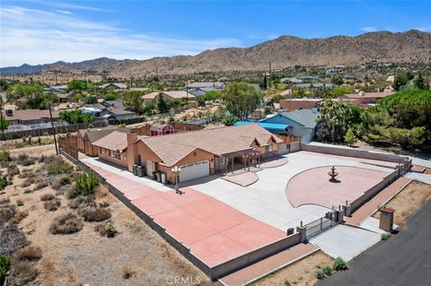 Photo of 57815 San Tropeze DR, Yucca Valley, CA 92284 (MLS # JT26113961)