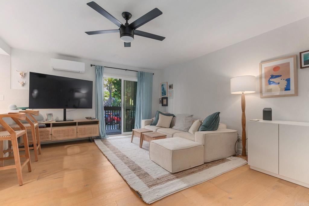 This beautifully remodeled 1-bedroom, 1-bath condo combines modern style with coastal convenience. Thoughtful upgrades include new hardwood floors throughout, custom cabinetry in the kitchen and bath, a sleek tiled shower, with a glass shower enclosure and a ventless stackable washer and dryer. The kitchen features stainless steel appliances, including a black stainless steel range, while the living area is equipped with an energy-efficient split HVAC system for year-round comfort. Ideally located less than two miles from Moonlight Beach, the energy of Coast Highway 101, and the shops and restaurants along El Camino Real. Enjoy the convenience of nearby favorites like Trader Joe’s, Sprouts, and Sephora—all just minutes away. Additional highlights include a reserved underground parking space, a private storage room, guest and street parking, and low HOA fees, which cover water and trash collection.