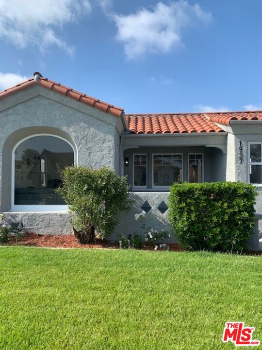 Very spacious beautiful, charming, Spanish style house. Newly remodeled kitchen and bathrooms, gas fireplace in living room, central air, central heat, vinyl flooring throughout, brand new stainless steel dishwasher, stove, fridge, washer & dryer included with sale. large formal dining room that can also be used as a family room, separate cozy breakfast room. Long driveway, gated back yard with a two car garage. As a bonus there's a legal Rec. Room approx. 525 sq. ft. in the rear that can easily be converted into an ADU for additional income! May also be used "As Is" for private office, gym, recording/video studio. Located in a very nice residential area adjacent to Morningside Park. Very close proximity to the Forum, So Fi Stadium, You tube Theatre, and trendy Downtown Inglewood.