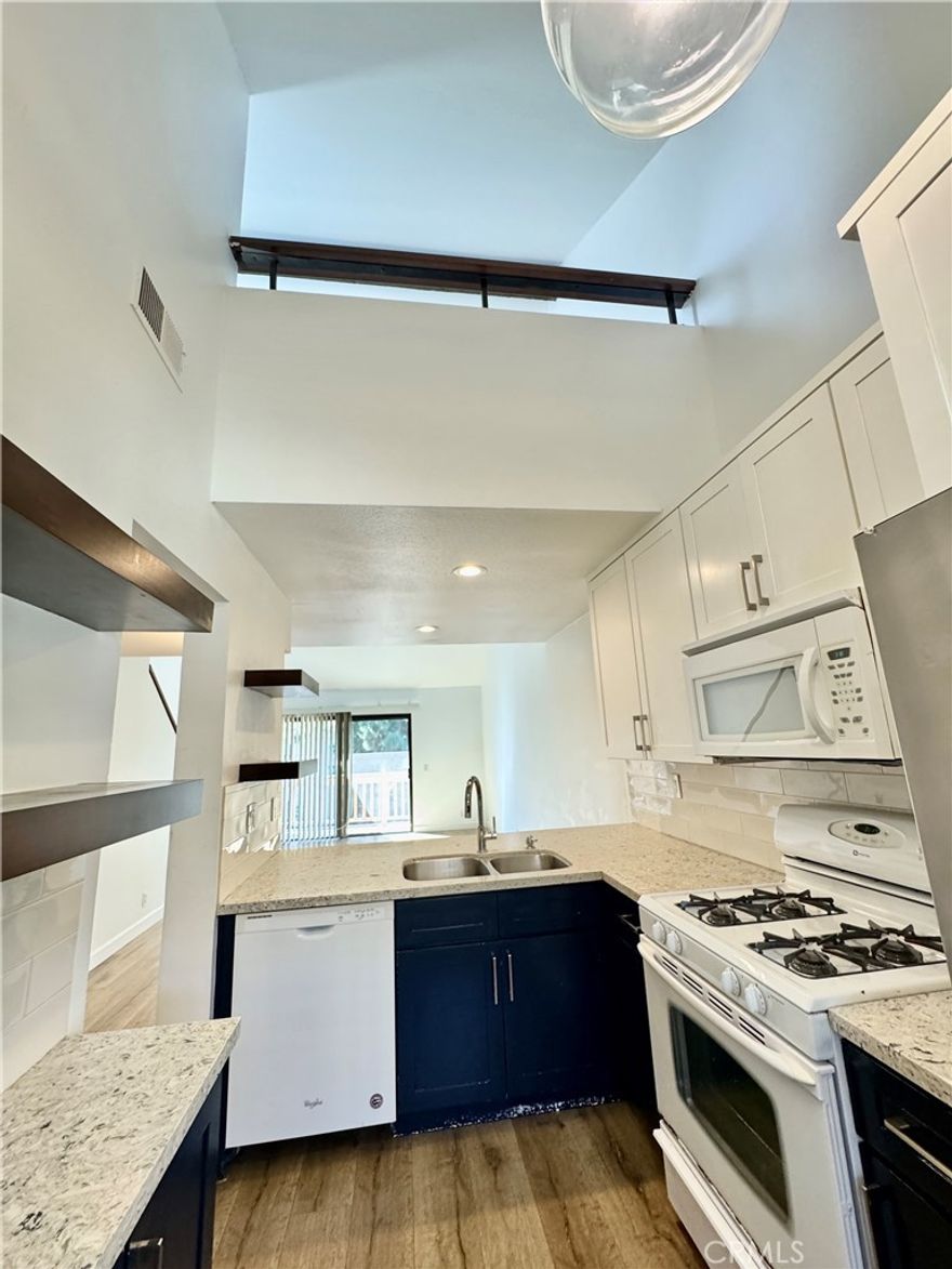 This bright and airy upper-level unit offers cathedral ceilings with serene views of a peaceful stream, framed by mature trees that provide natural privacy. Thoughtfully remodeled several years ago, the home features 1 bedroom, 1 bathroom, and a versatile loft—perfect for a home office or optional second bedroom.

Stylish vinyl flooring flows throughout the living room, kitchen, and bedroom. The unit includes central A/C and a convenient in-unit stackable washer and dryer tucked away in a closet off the bedroom. 



The kitchen is equipped with a gas stovetop and quartz countertops with self-close drawers, a microwave, stove, and refrigerator. Located in the desirable Orange Tree community, residents enjoy access to a wide array of amenities including a pool, spa, fitness center, tennis and pickleball courts, basketball courts, a clubhouse, and BBQ areas ideal for hosting larger gatherings.