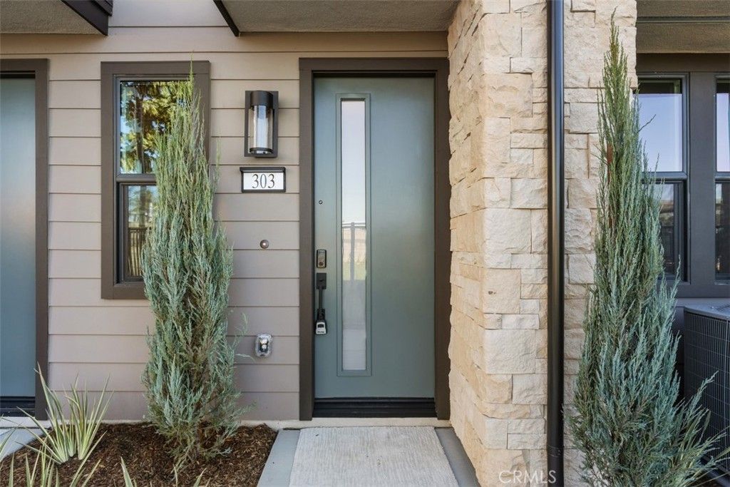 Photo of 109 S Laxore Street #303, Anaheim, CA 92804 (MLS # LG25271346)