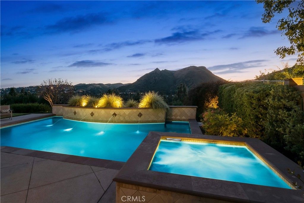 Photo of 7343 Rutherford Hill Dr, West Hills, CA 91307 (MLS # SR26072881)