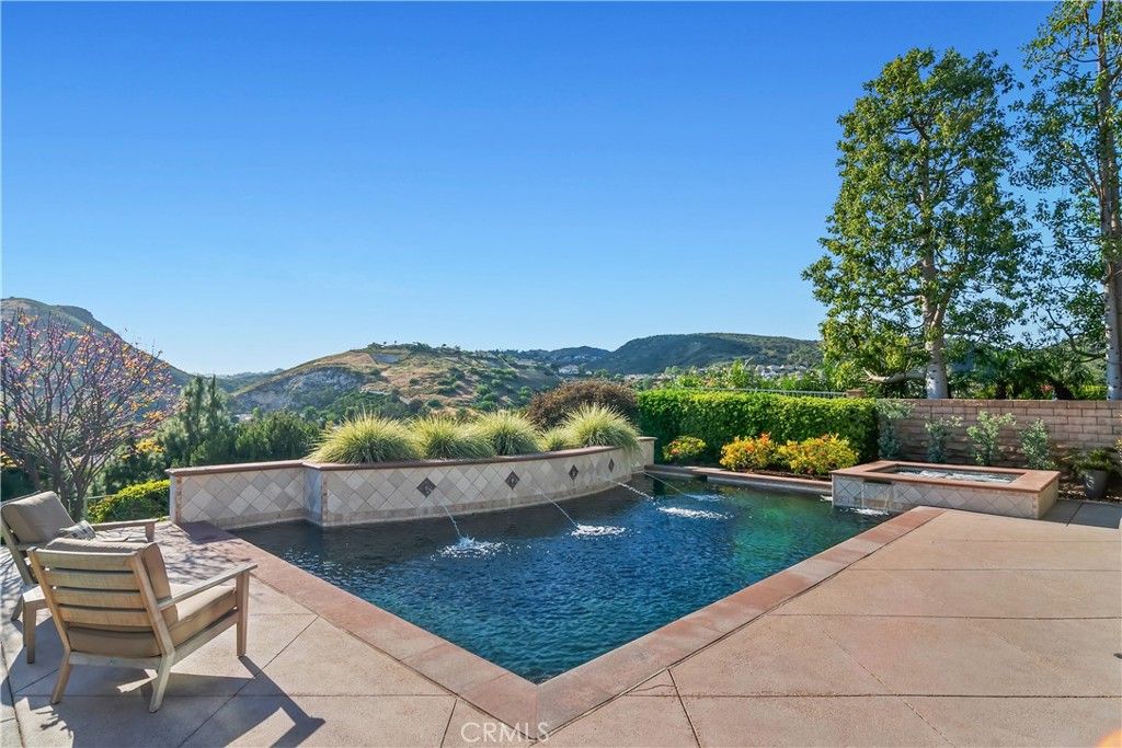 Photo of 7343 Rutherford Hill Dr, West Hills, CA 91307 (MLS # SR26072881)