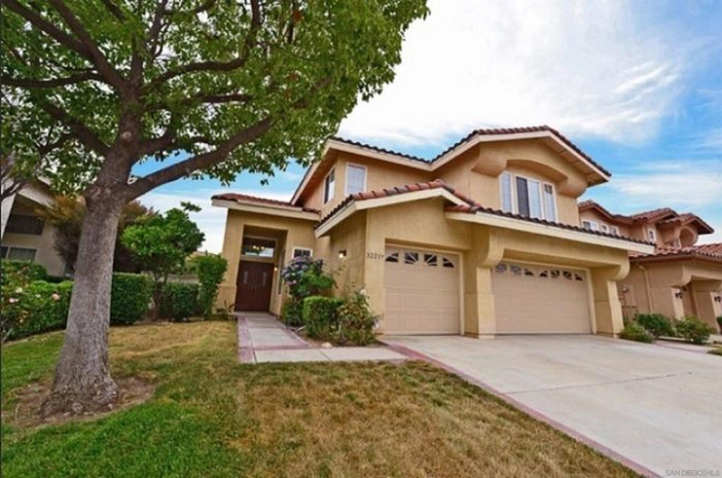Beautiful and upgraded home in Red Hawk. 5 bedrooms plus loft/bonus room, 3 full bathrooms, bedroom and bathroom on first level. Amazing kitchen with lovely granite counter tops, island with cook top and stainless appliances. Open floor plan with formal living room and dining room. Convenient first floor laundry room with ample storage and sink. 4 roomy bedrooms upstairs including master bedroom with 2 walk in closets. Low maintenance yard has mature fruit trees.