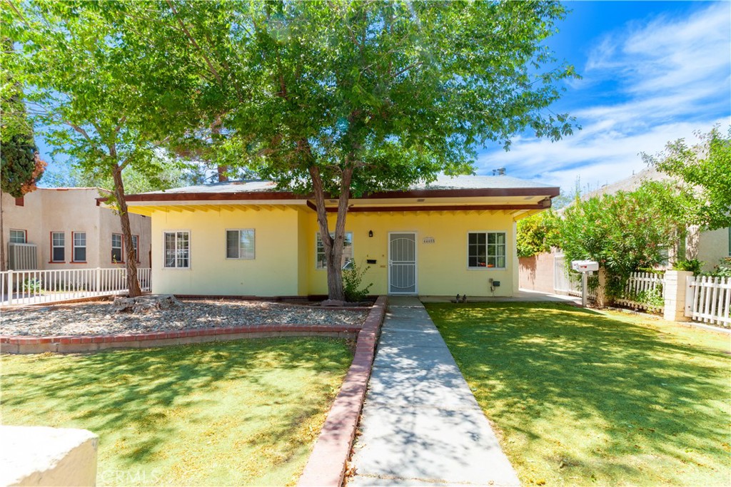Great investment opportunity in Lancaster! This multi-unit property features a 2 beds, 1.5 bath front unit with a spacious kitchen, cozy fireplace, laundry room, and large private patio. The second unit offers 1 bed, 1 bath, plus a bonus studio with its own bath—ideal for extended family or rental income. Beautiful natural light throughout, with mature trees providing shade in both the front and back yards. A must-see with tons of potential!