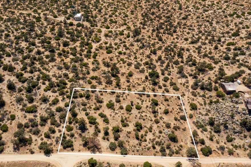 Discover the perfect canvas for your dream home in the tranquil Pinyon Crest Community of Mountain Center. This 1.81-acre vacant lot offers breathtaking valley views and a serene, private setting, providing a rare opportunity to create your own haven amidst natural beauty.